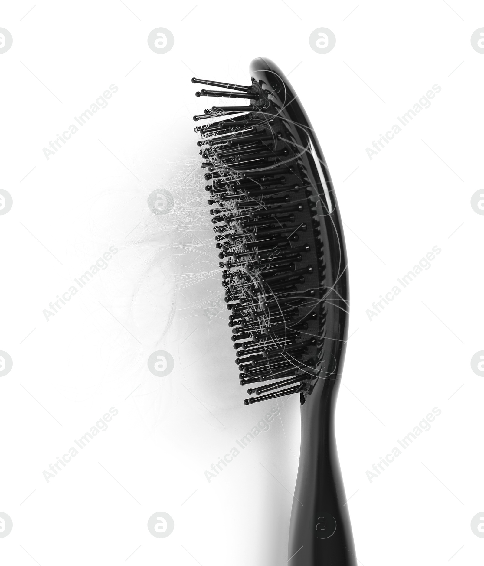 Photo of Brush with lost hair isolated on white, top view