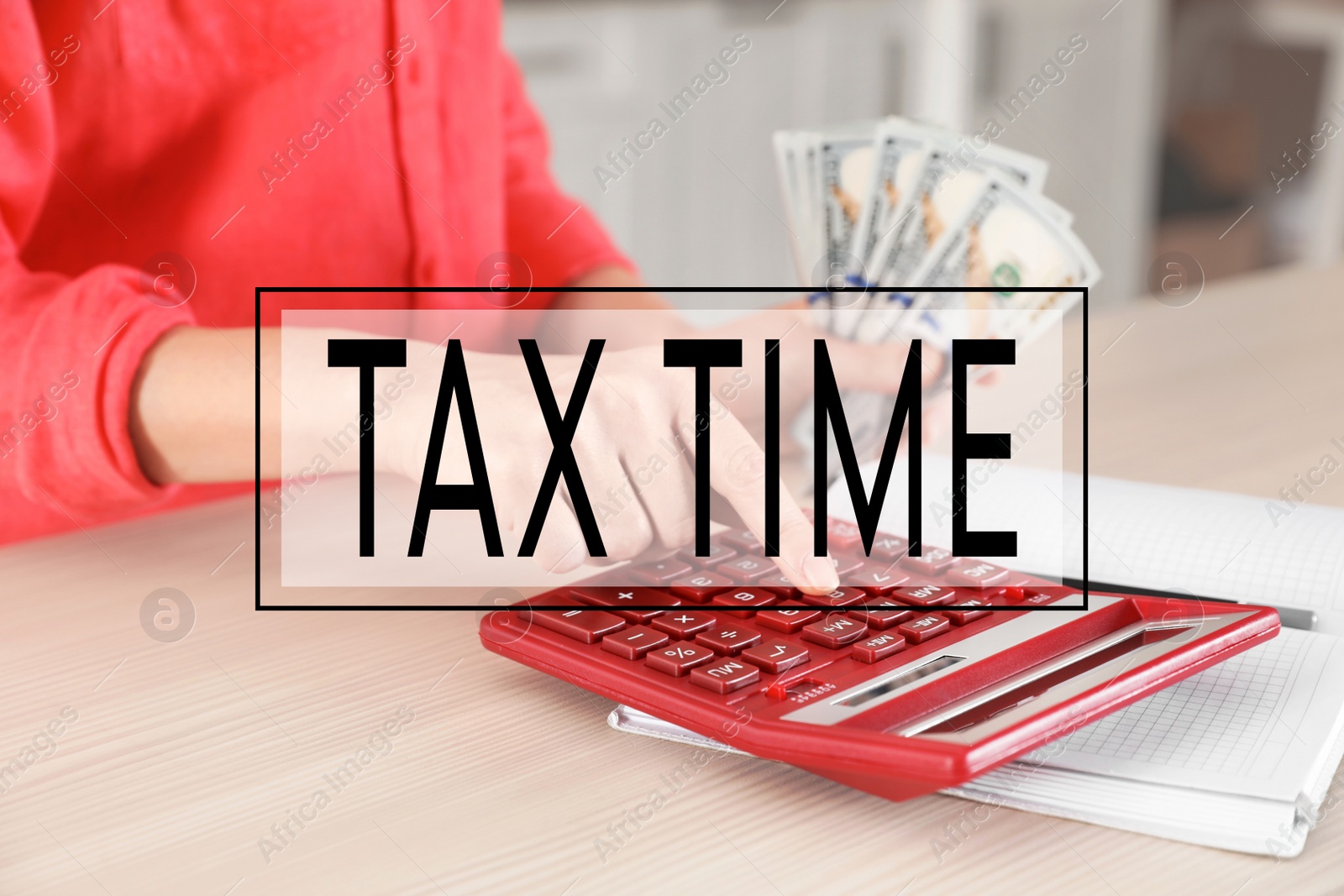 Image of Tax accountant working with calculator and money at table, closeup