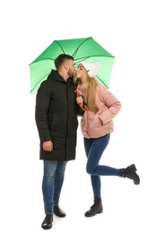 Full length portrait of beautiful couple with umbrella, isolated on white