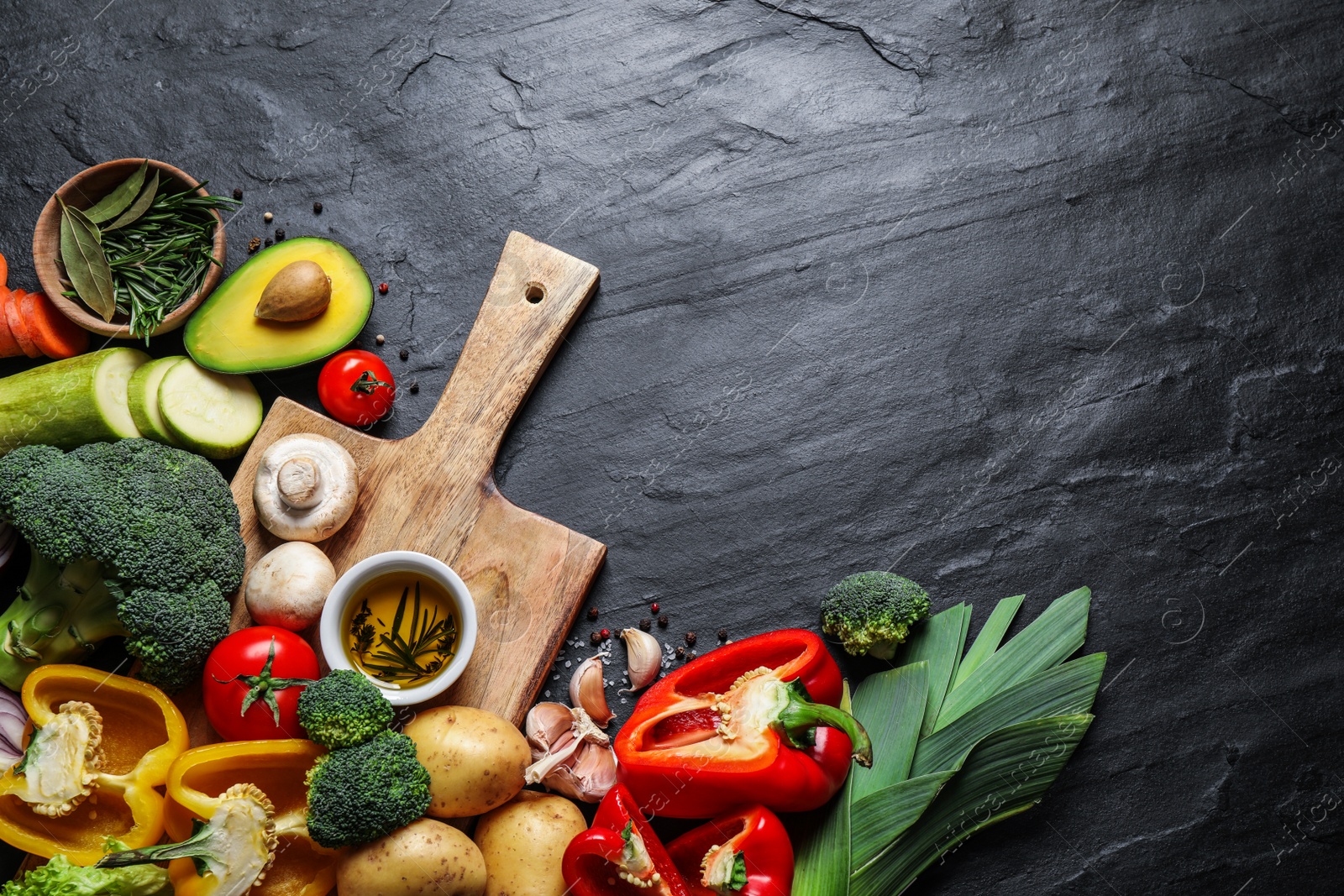 Photo of Flat lay composition with fresh products on grey table, space for text. Healthy cooking