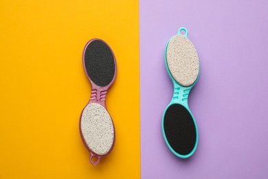 Photo of Pedicure tools with pumice stones and foot files on color background, flat lay