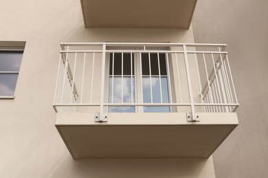 Exterior of beautiful building with empty balcony