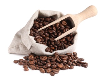 Photo of Bag and wooden scoop with roasted coffee beans isolated on white