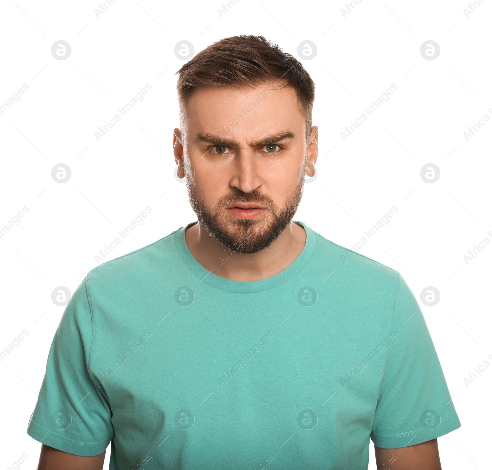 Photo of Angry young man on white background. Hate concept