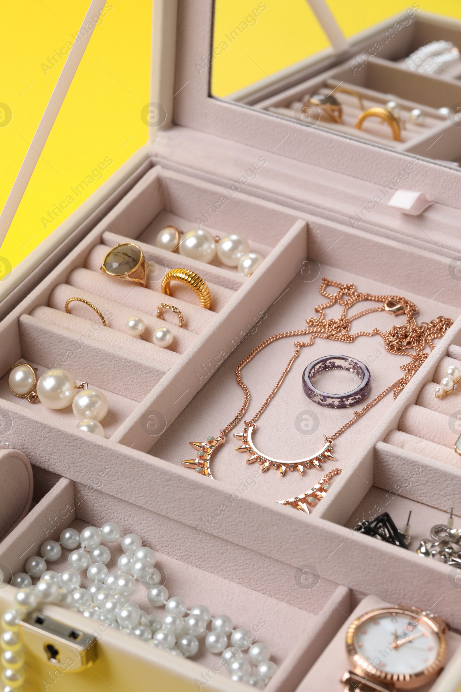 Photo of Jewelry box with many different accessories, closeup