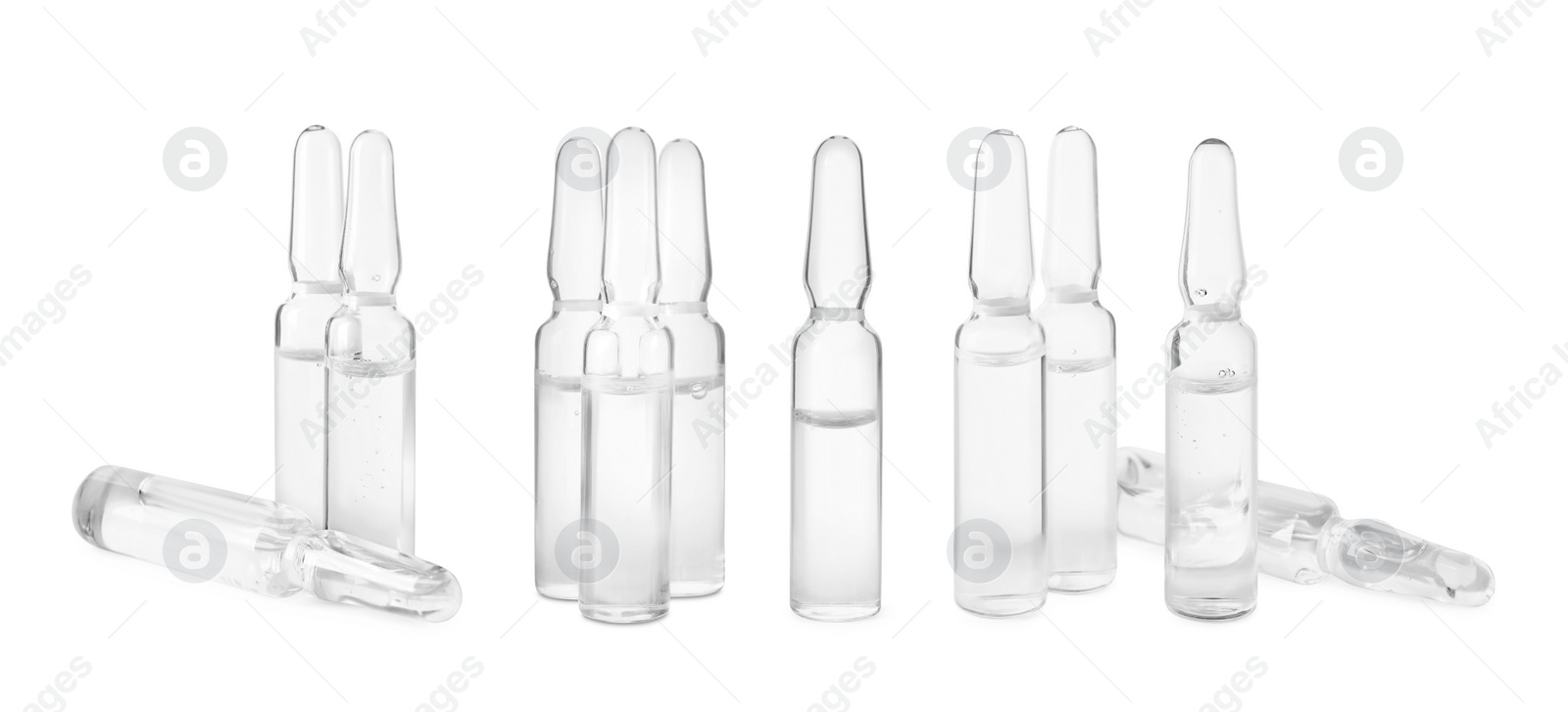 Image of Set with glass ampoules with pharmaceutical products on white background. Banner design