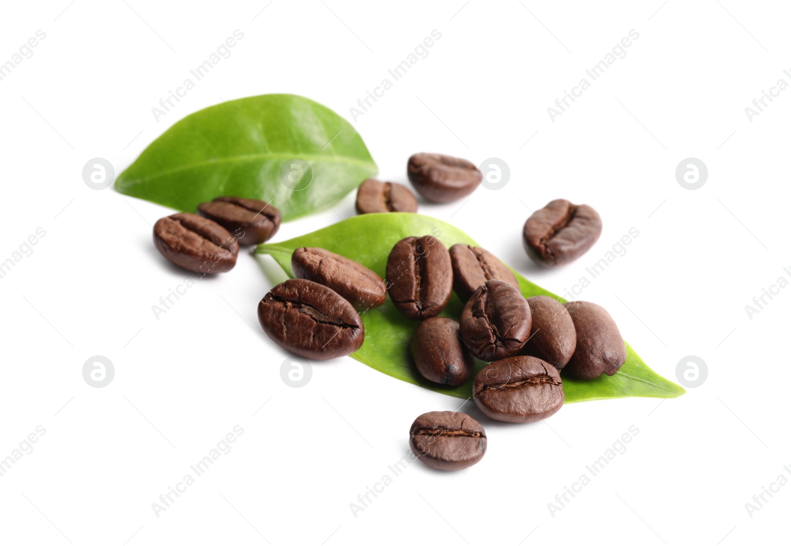 Photo of Roasted coffee beans and leaves isolated on white