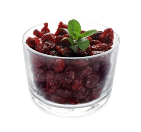 Photo of Tasty dried cranberries and leaves in glass isolated on white