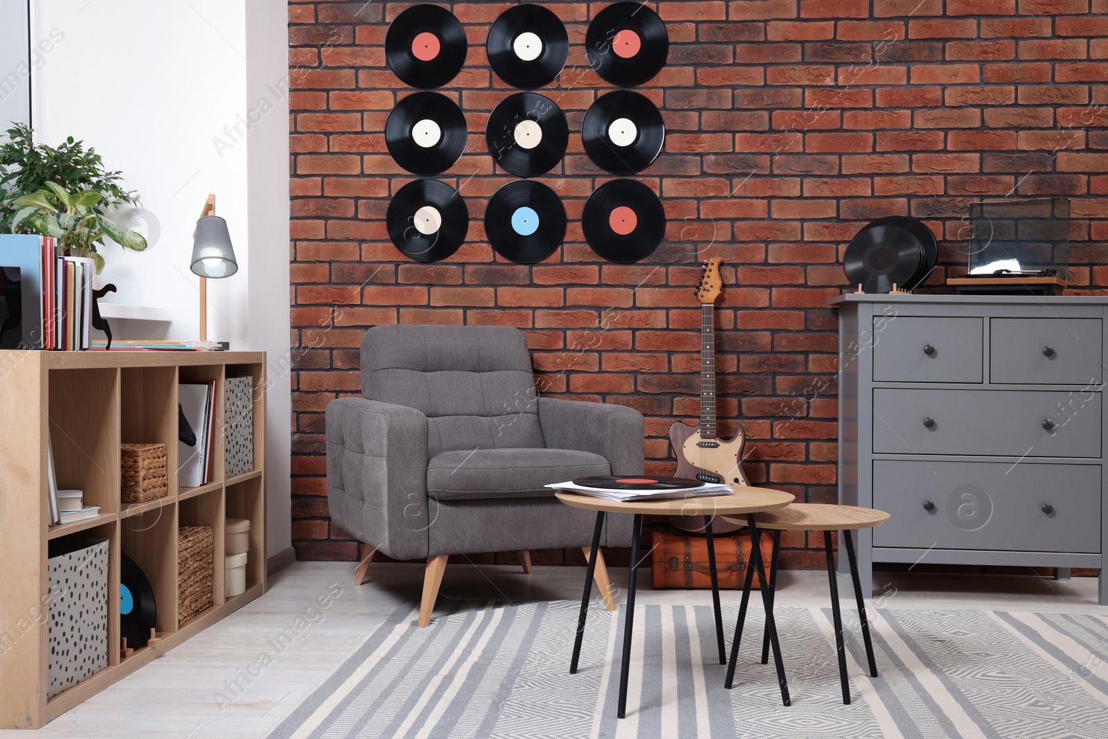 Photo of Living room decorated with vinyl records. Interior design