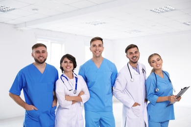 Photo of Team of doctors in uniform at workplace