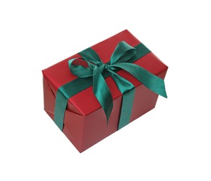 Photo of Red gift box with green bow isolated on white