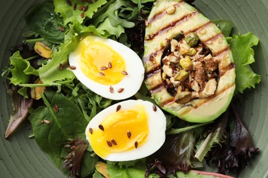 Photo of Healthy dish high in vegetable fats in bowl, top view