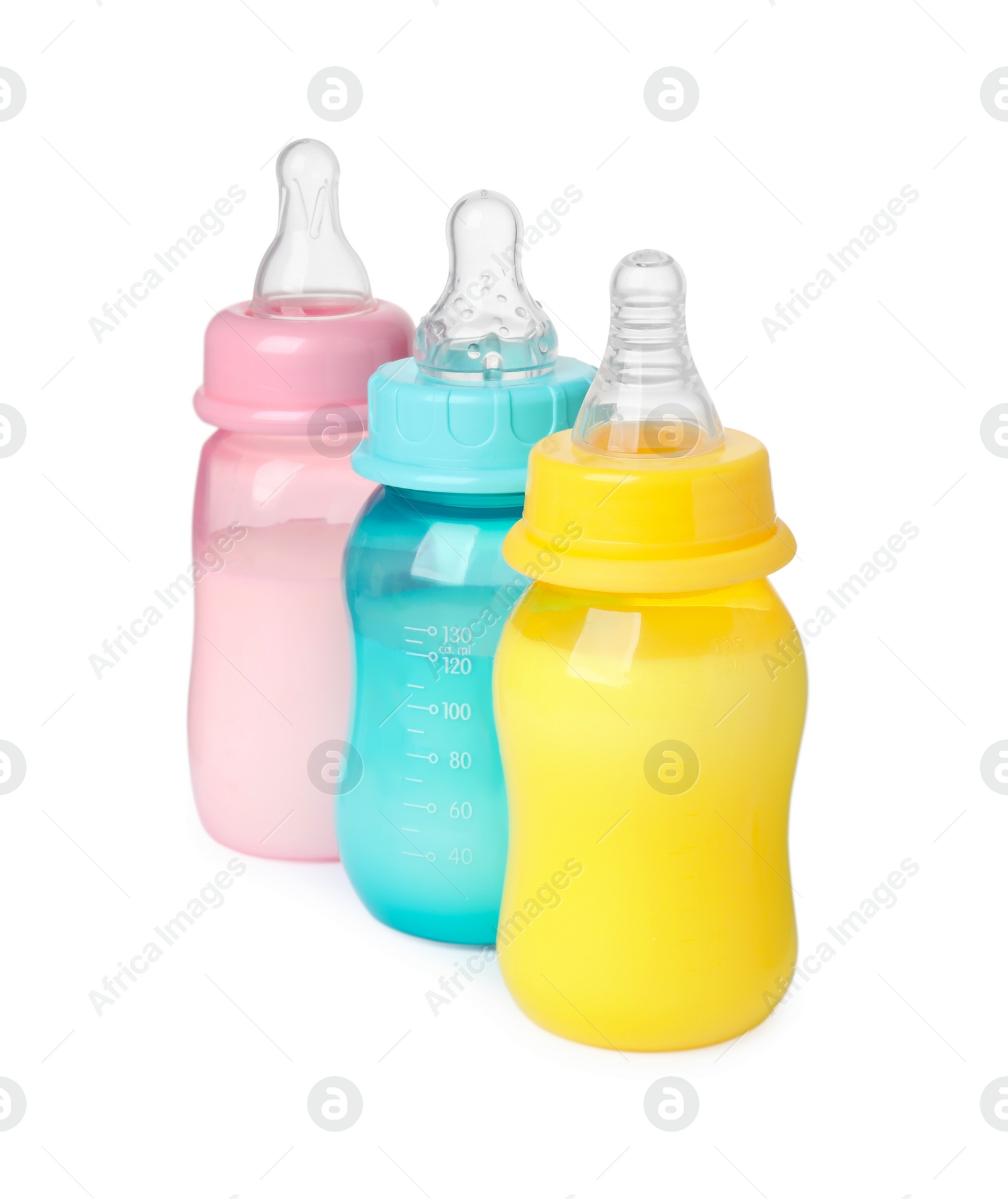 Photo of Feeding bottles with milk on white background