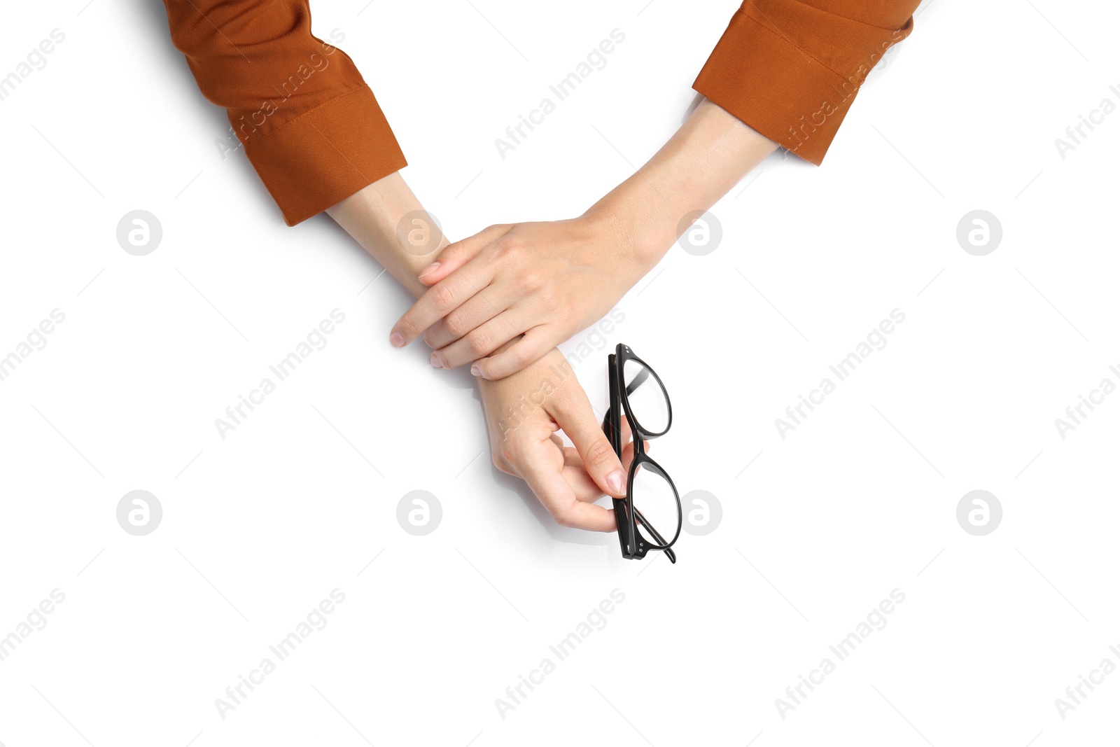 Photo of Woman with glasses on white background, top view. Closeup of hands