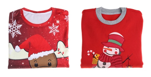 Image of Two red folded Christmas sweaters on white background