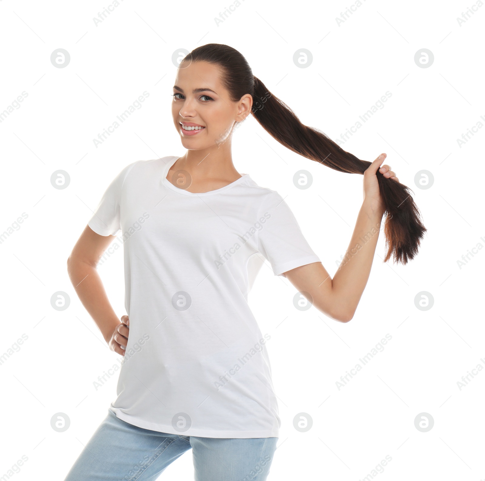 Photo of Young woman in t-shirt on white background. Mockup for design