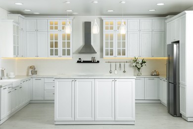 Photo of Luxury kitchen interior with new stylish furniture