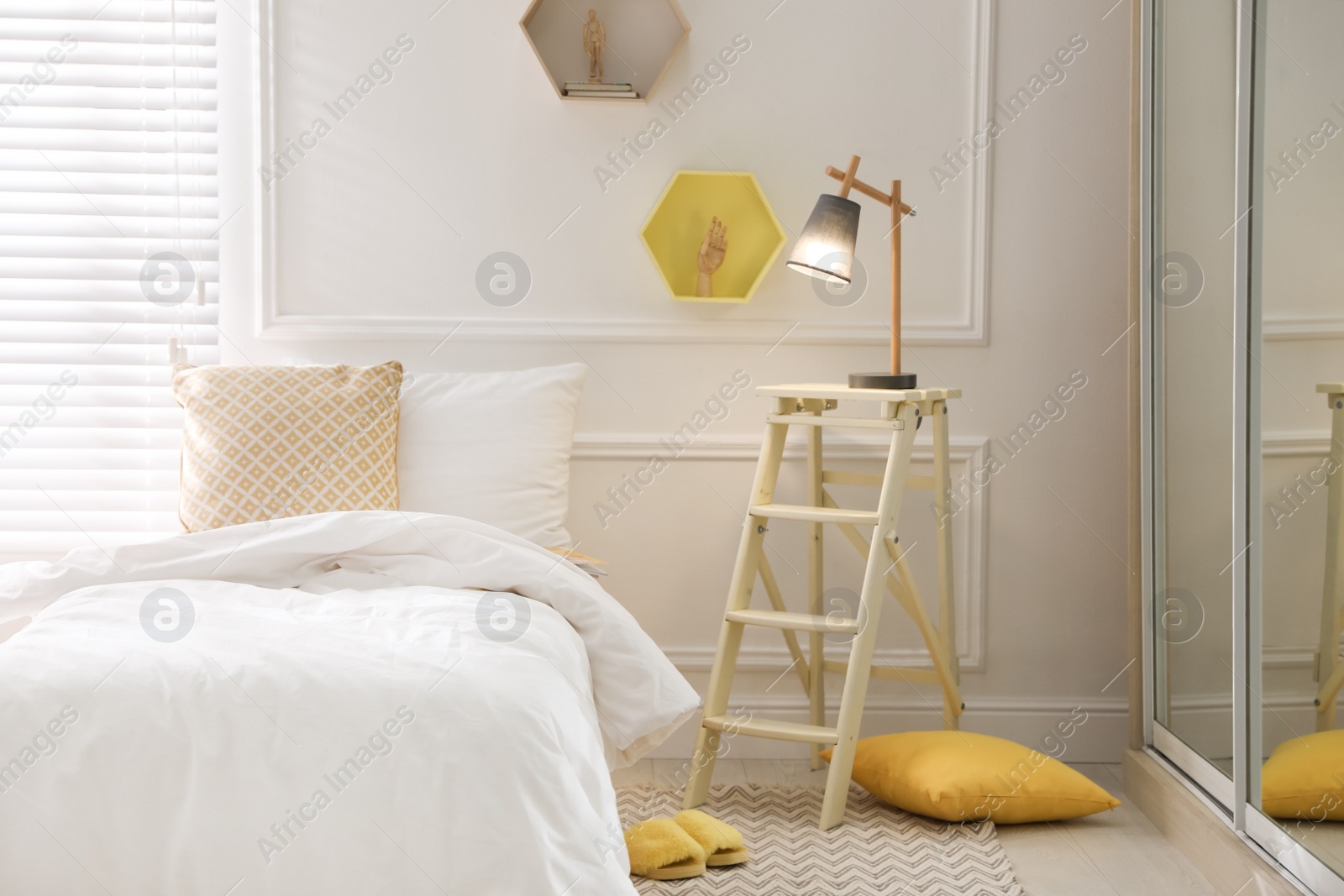 Photo of Comfortable bed with clean white linens indoors