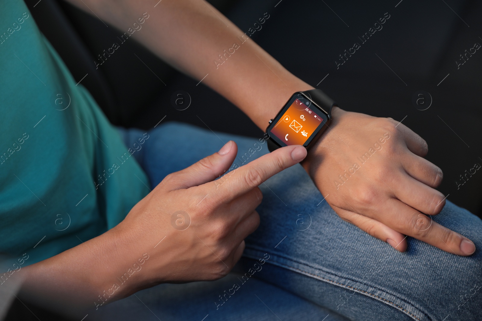 Image of Woman using modern smart watch in car, closeup