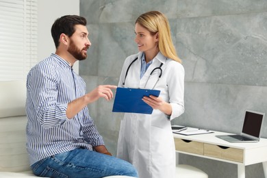 Patient having appointment with doctor in clinic