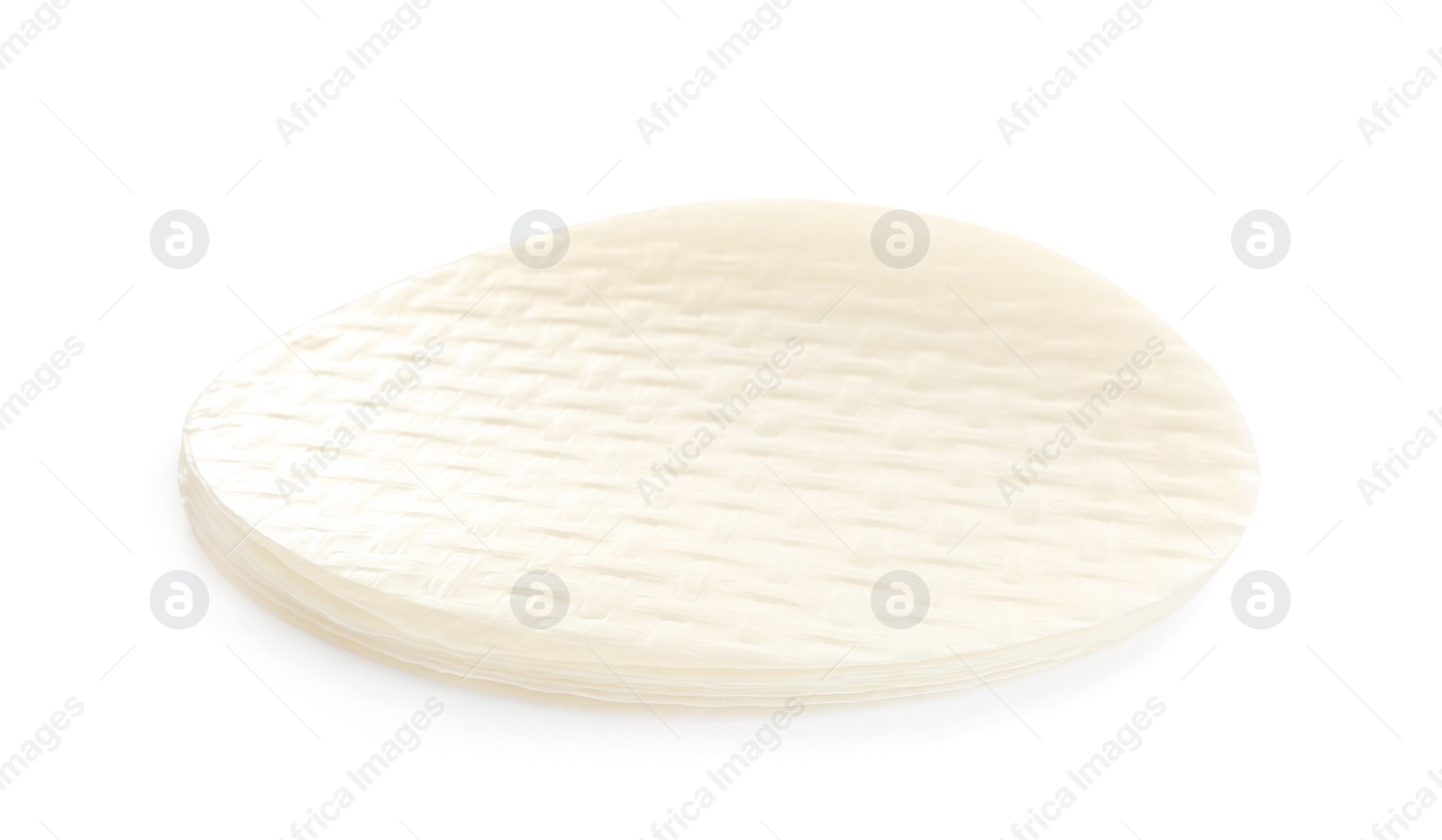 Photo of Stack of dry rice paper isolated on white
