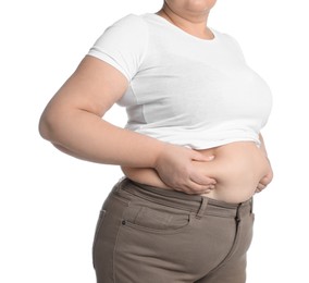 Photo of Overweight woman in tight t-shirt and trousers on white background, closeup