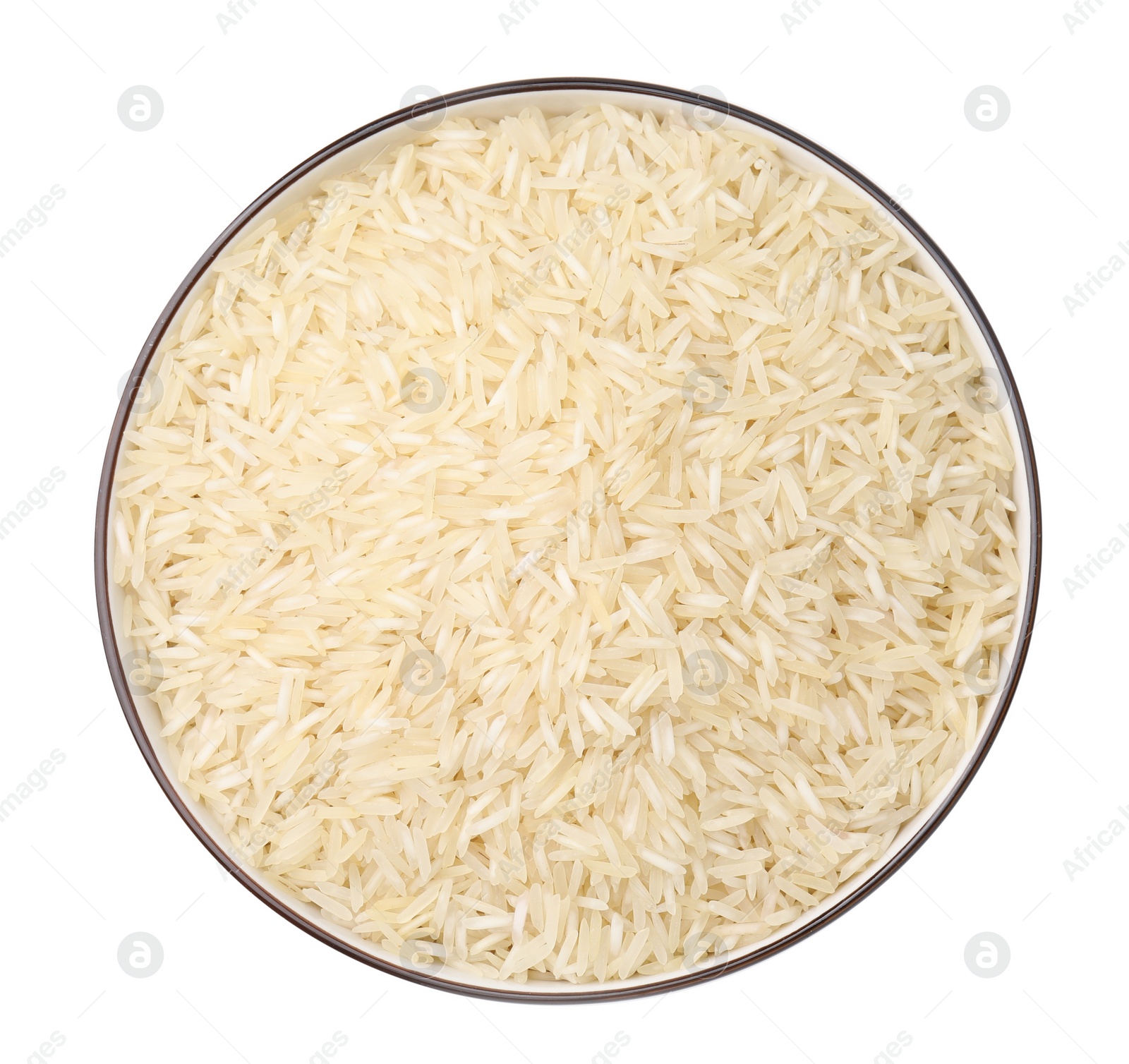 Photo of Raw rice in bowl isolated on white, top view