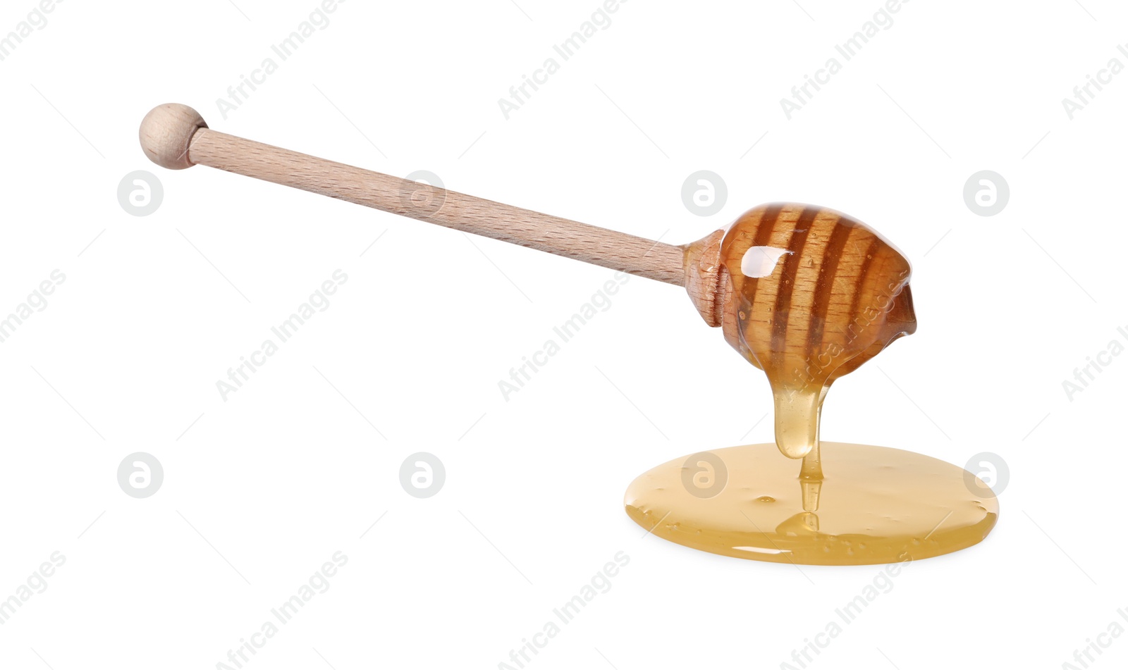 Photo of Natural honey dripping from dipper on white background