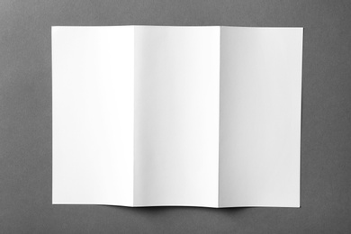 Photo of Blank brochure mock up on color background