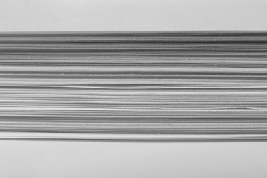 Stack of paper sheets as background, closeup