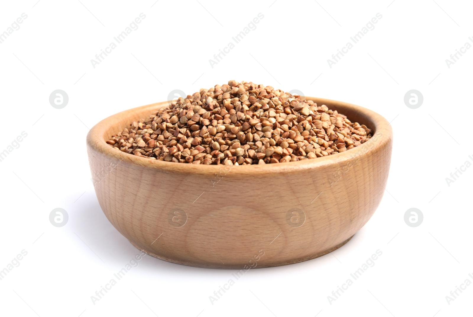 Photo of Bowl with uncooked buckwheat on white background