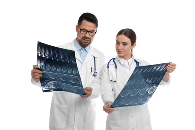 Photo of Orthopedists holding X-ray pictures on white background