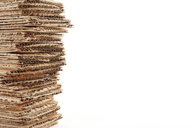 Photo of Stack of cardboard on white background. Recyclable material