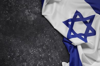 Photo of Flag of Israel on grey textured background, top view and space for text. National symbol