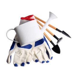 Photo of Gardening gloves, tools and watering can on white background, top view