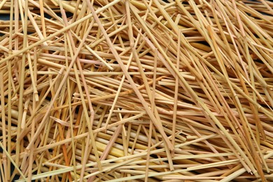 Heap of dried hay as background, top view