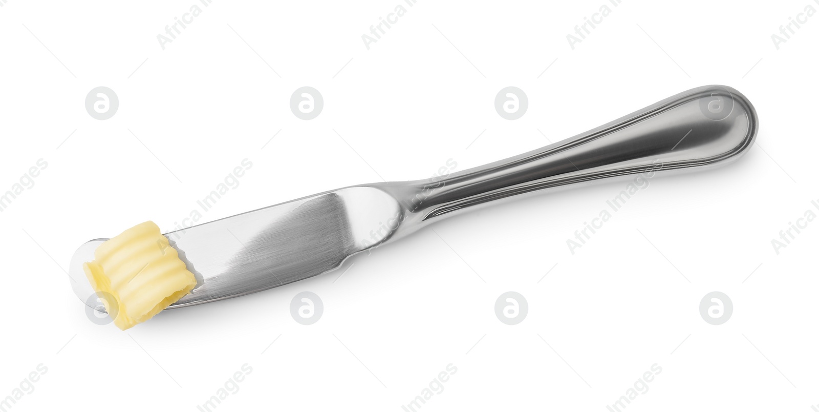Photo of Butter curl and knife isolated on white, top view