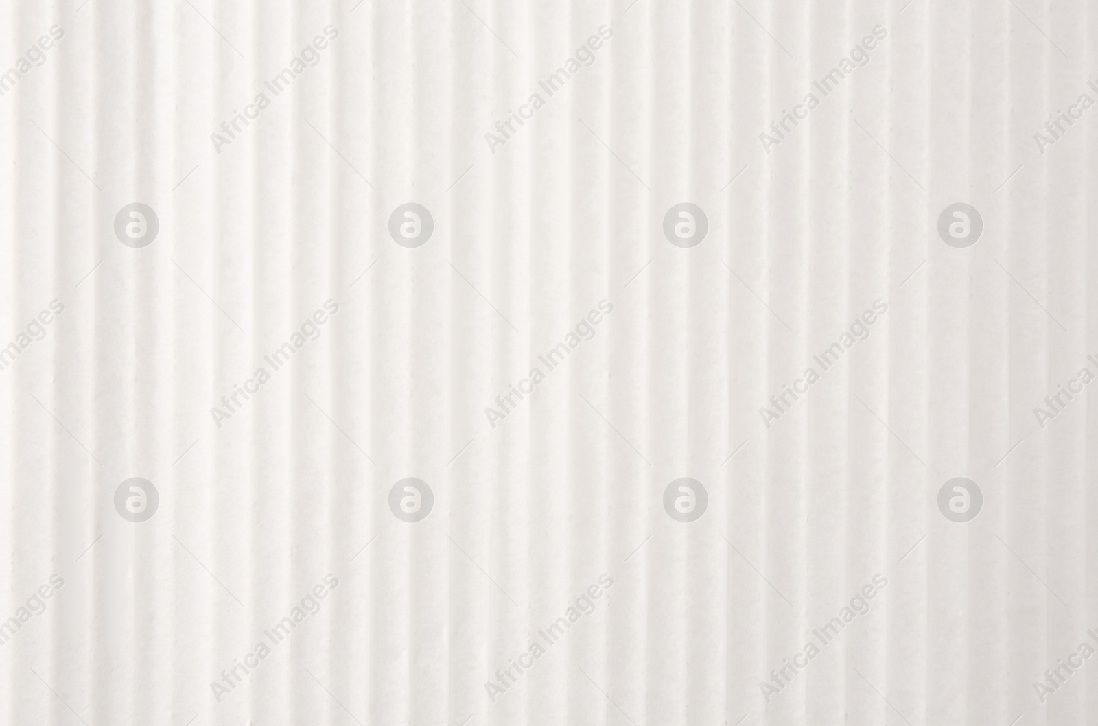 Photo of Texture of white paper sheet as background, closeup