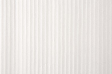 Photo of Texture of white paper sheet as background, closeup