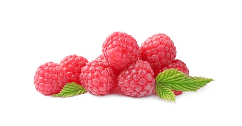 Many fresh ripe raspberries and green leaves isolated on white