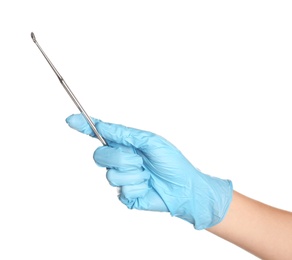 Doctor in sterile glove holding medical tool on white background