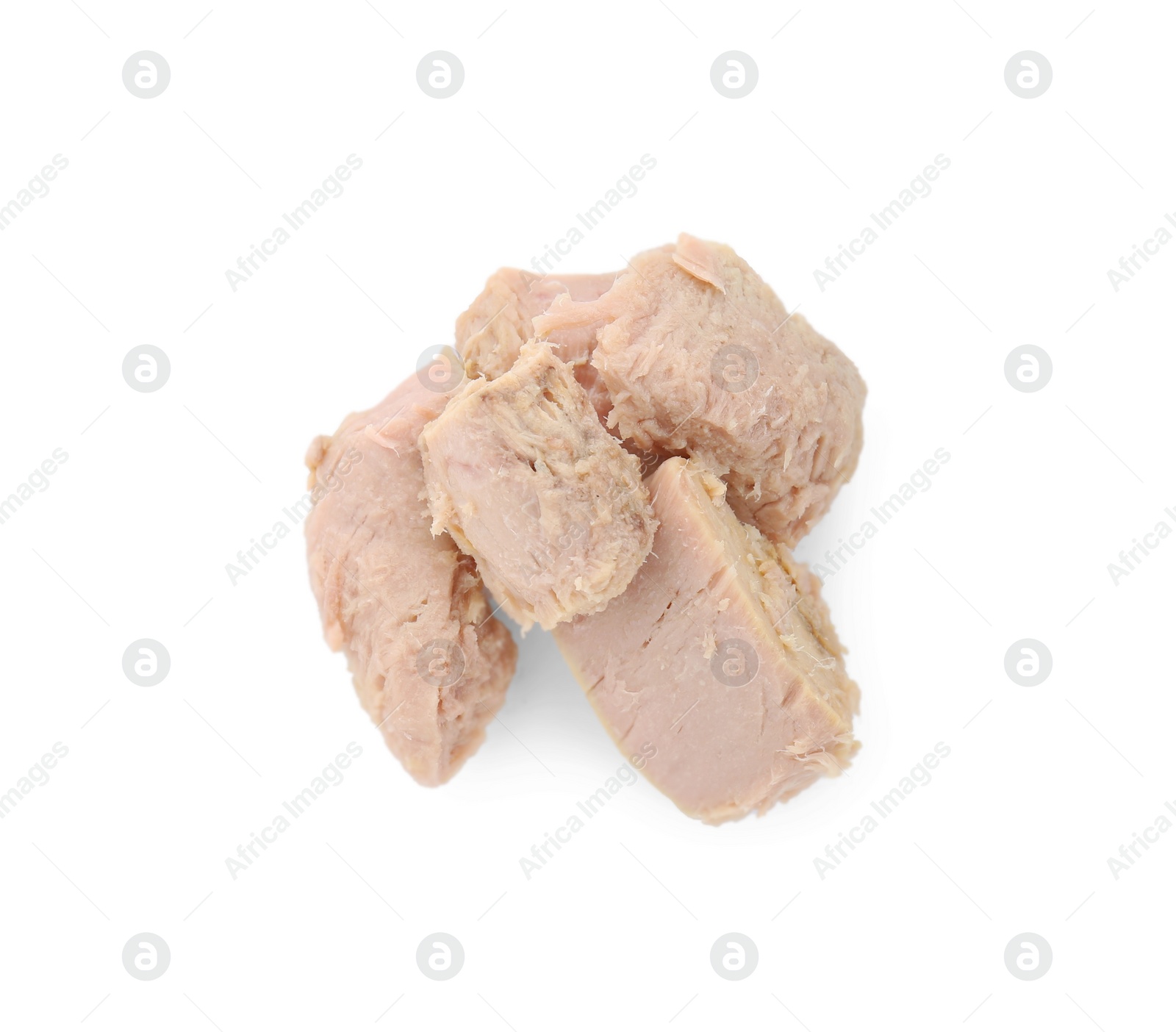 Photo of Delicious canned tuna chunks isolated on white, top view
