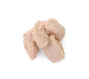 Photo of Delicious canned tuna chunks isolated on white, top view