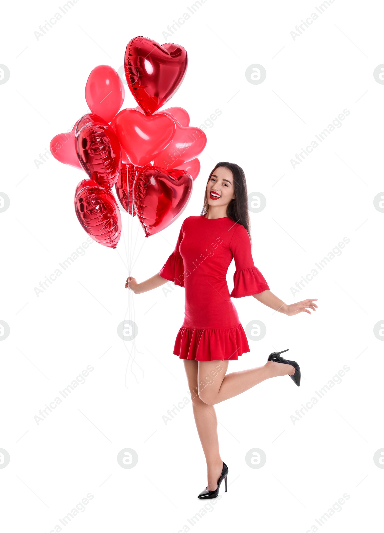 Photo of Beautiful girl with heart shaped balloons isolated on white. Valentine's day celebration