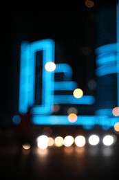 Photo of Blurred viewcityscape with bokeh effect. Night life