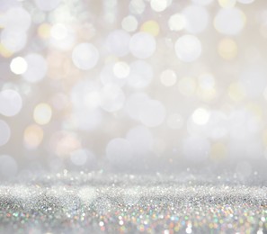 Image of Shiny silver glitter as background. Bokeh effect