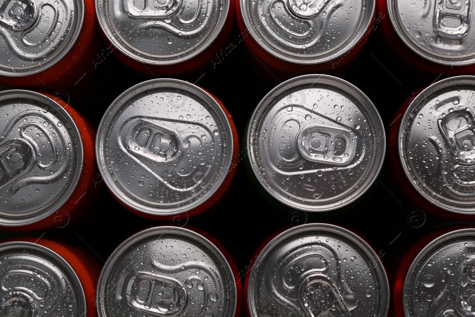 Photo of Energy drink in cans, top view. Functional beverage