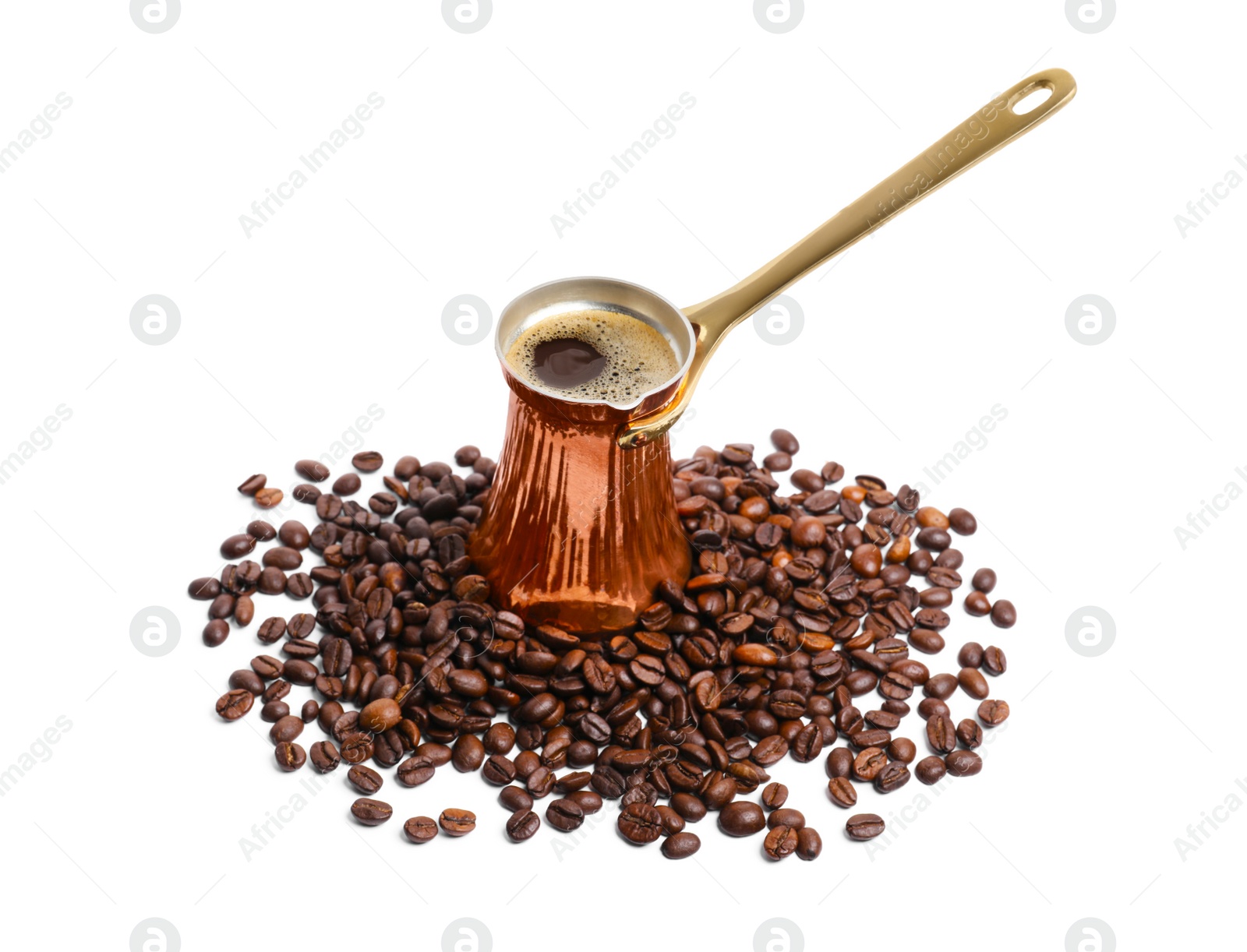 Photo of Copper turkish coffee pot with hot drink and beans on white background