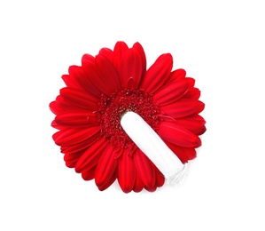 Flower and tampon on white background, top view. Gynecological care