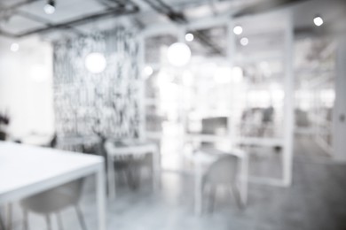 Image of Office interior. Blurred view of comfortable workspace